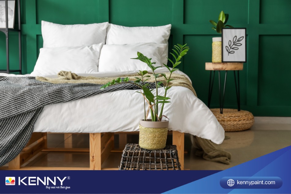 Phòng ngủ ấm cúng với tường sơn màu xanh lá kết hợp với trang trí thiên nhiên